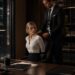 Lucas and Lucia face each other in his office during an increasingly tense confrontation.