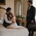 Aiden holding frightened Tess on the bed while a serious doctor stands nearby with his bag